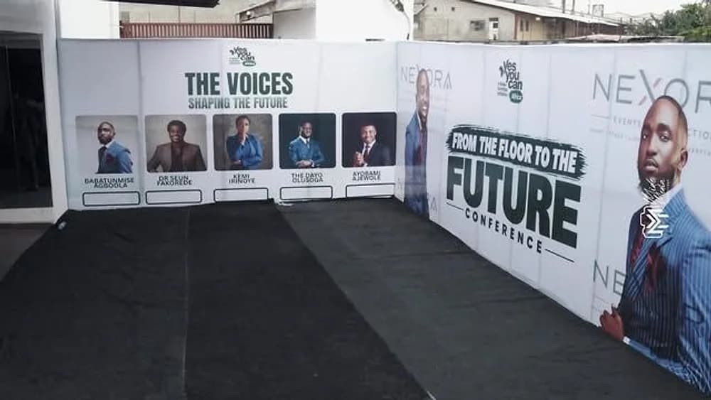Branded conference backdrop at the Yes You Can Africa event